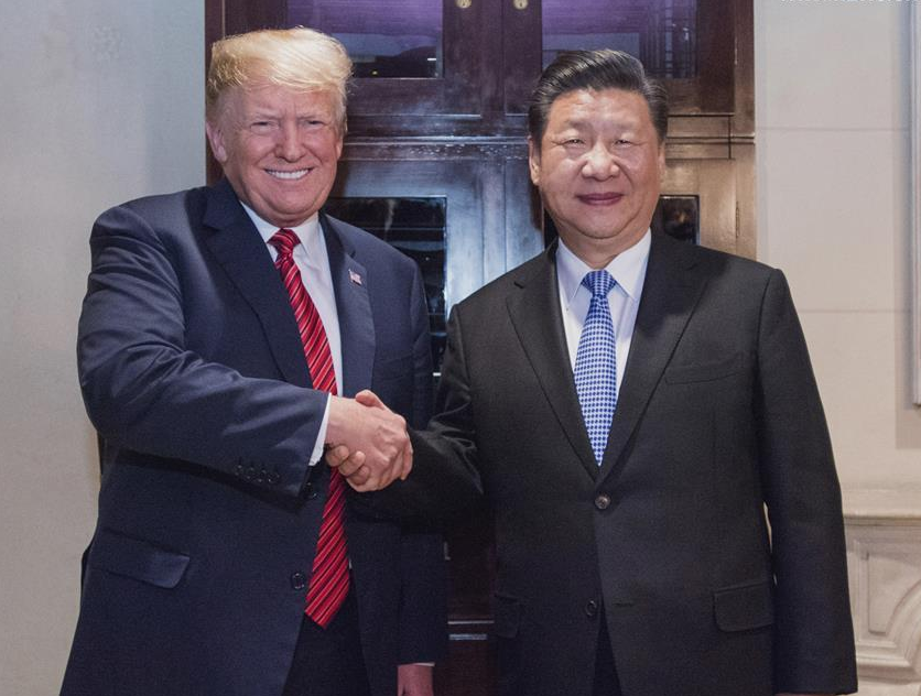 Presidente da China e dos Estados Unidos apertam as mãos