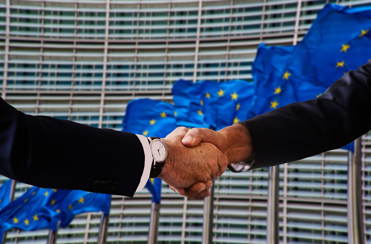 apertro de mãos com membro da União Europeia (UE)